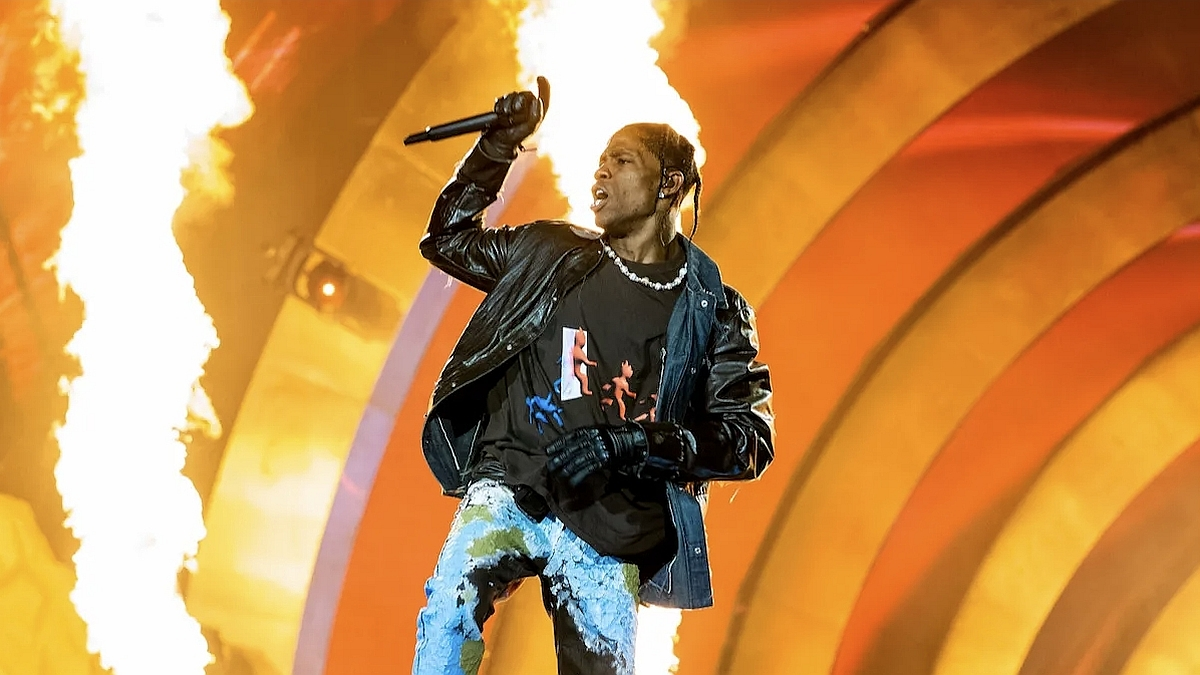 Travis Scott performing on stage during the 'Utopia' album release concert.